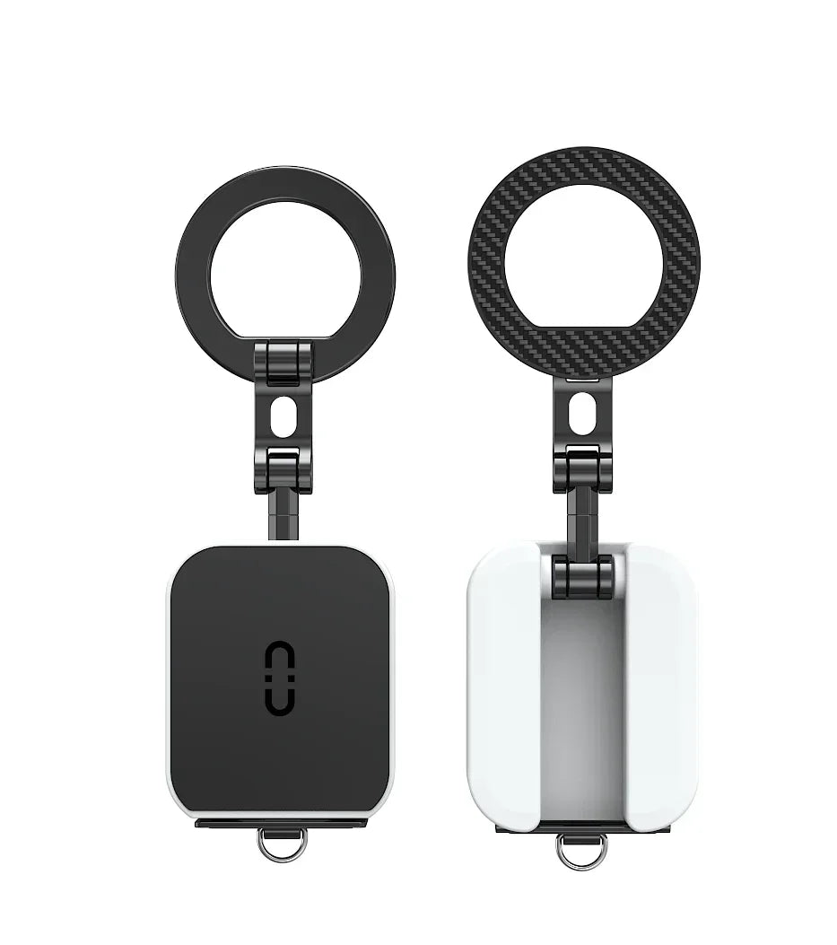 Front and back view of the foldable phone stand, showing the all-black version from the back and the white version from the front, highlighting the carbon fiber texture on the magnetic ring.